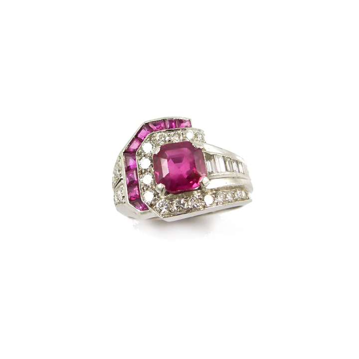 Ruby and diamond geometric cluster ring centred by an octagonal cut Burma ruby